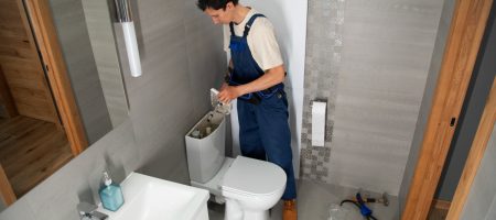 male-plumber-working-fix-problems-client-s-house